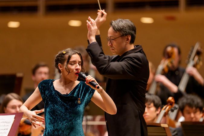 Vocalist Ana Everling sings while Principal Conductor Ken-David Masur guides the Civic Orchestra in the background