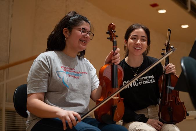 two violins speaking